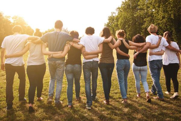 Community Involvement - Group of Volunteers Walking Together After a Long Day of Volunteering