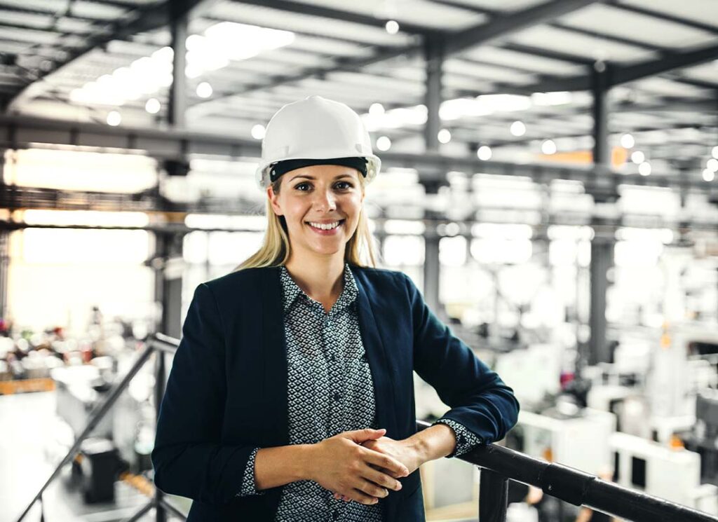 General Liability Insurance - Conservation Unitedustrial Woman Engineer Standing in a Large Factory