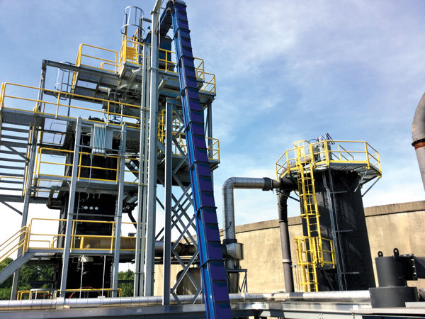 Industrial pyrolysis machine producing biochar from biomass waste for sustainable farming