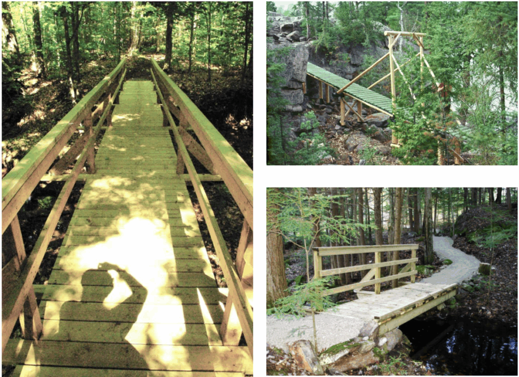 Team constructing a climate-resilient trail bridge with tools and safety measures