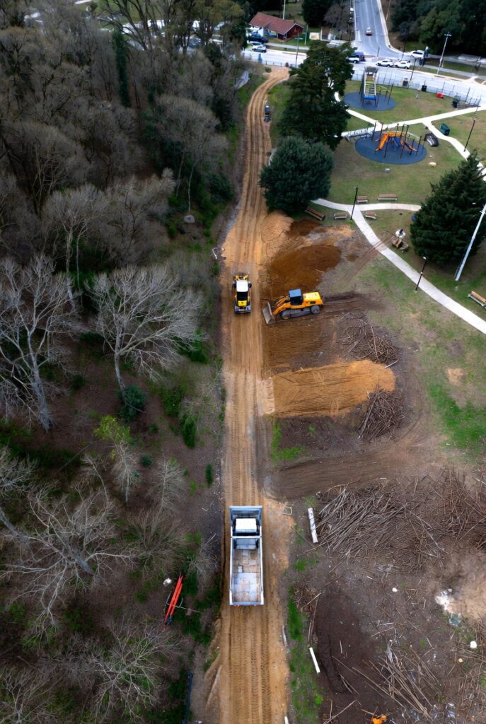 Government-funded trail construction protected by Conservation United surety bonds in urban park setting